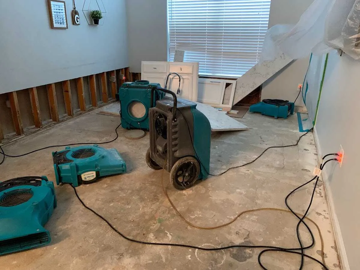 Dehumidifier in flood-cut room for Water Damage Restoration in Boaz